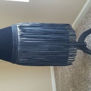 Unique Leather Strips Skirt with Suede around waist and fabric underneath.